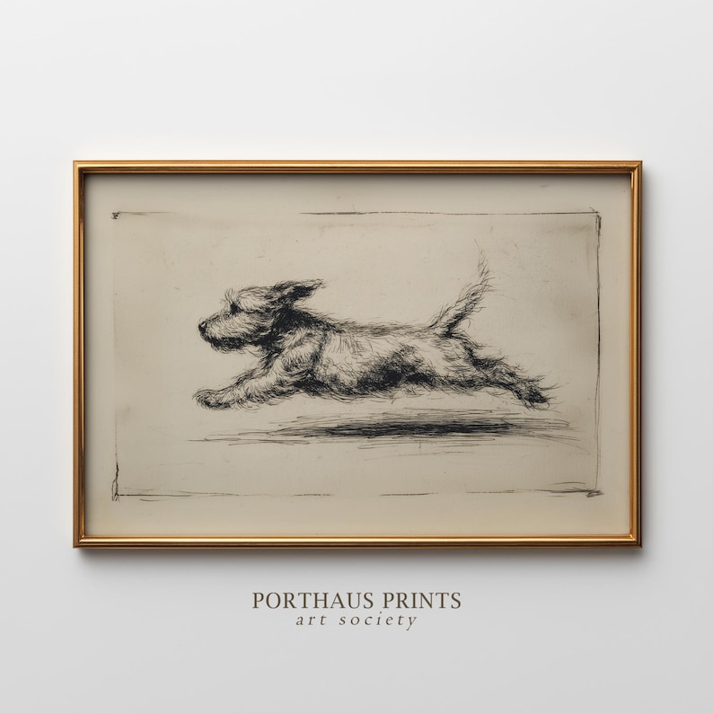 May include: A framed black and white etching of a running dog. The dog is depicted in mid-stride, with its legs extended and tail up. The artwork is set against a neutral background and framed in a gold-colored frame. The text "PORTHAUS PRINTS art society" is at the bottom.