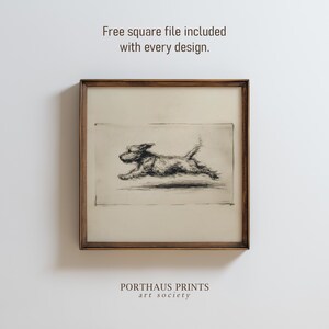 May include: A framed print featuring a running dog illustration in black and white. The artwork is set against a beige background, enclosed within a wooden frame. Text at the top reads, "Free square file included with every design."