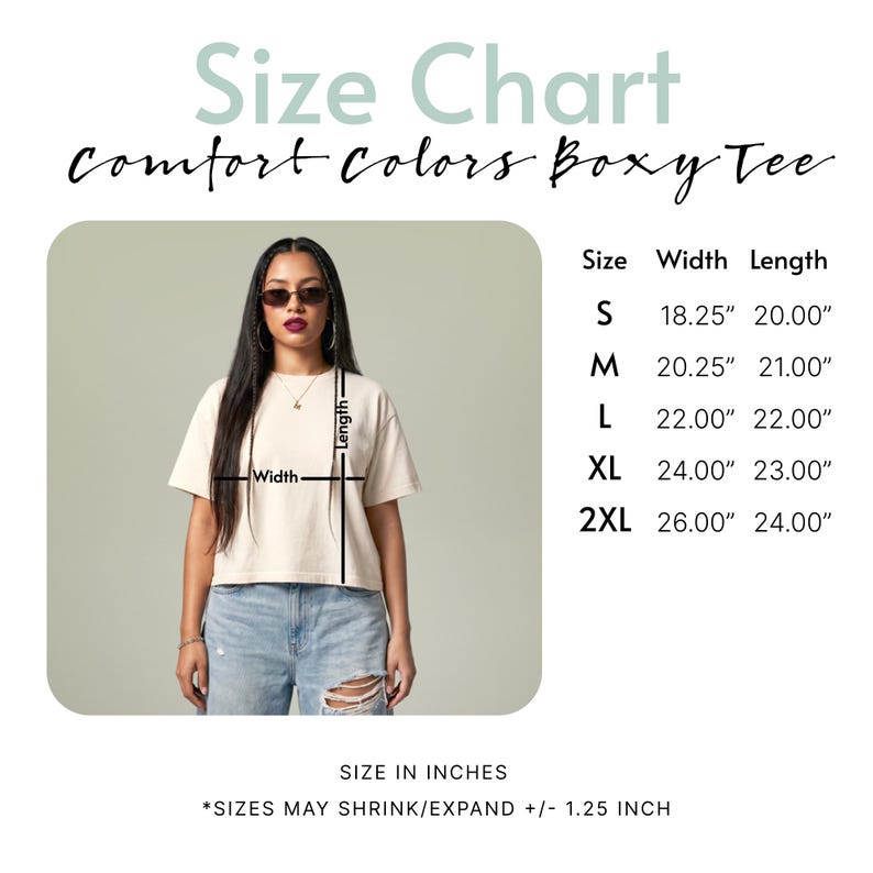 May include: A size chart for a Comfort Colors boxy tee, displaying a beige t-shirt with width and length measurement lines. A table lists sizes S through 2XL with dimensions in inches, noting that sizes may shrink or expand by 1.25 inches.