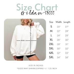 May include: A Gildan 18000 size chart for a white crewneck sweatshirt. The chart displays width and length measurements in inches for sizes S through 5XL, ranging from 20 to 34 inches in width and 27 to 34 inches in length, with a 1.25 inch variance.