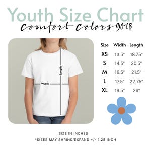 May include: A Youth Size Chart for Comfort Colors 9018 t-shirts. The chart displays a white t-shirt with width and length measurement lines, alongside a table listing sizes XS to XL with corresponding dimensions in inches. A blue flower icon is included.