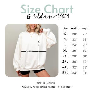 May include: Cream-colored Gildan 18000 sweatshirt size chart. The chart lists sizes S to 5XL with width and length measurements in inches. The image shows a person wearing the sweatshirt. The text says "Size Chart" and "SIZE IN INCHES".