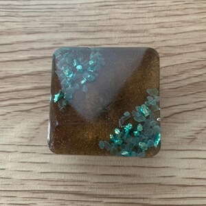 Mango de resina y vidrio triturado