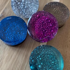 Handmade epoxy resin door knobs with a bubble effect