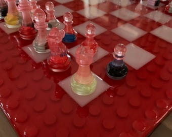 Handmade resin chess sets with Lego pieces inside
