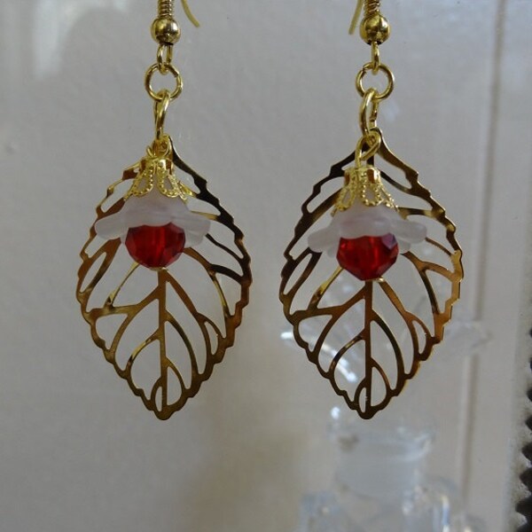 Beautiful Gold Filigree Leaf, A White Flower topped with Gold, Cradling a Red Swarovski Crystal Dangle Earrings