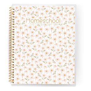 May include: A spiral-bound notebook with a floral pattern of white and light orange flowers and green leaves. The cover has the word "Homeschool" in a light brown script. The spiral binding is gold.