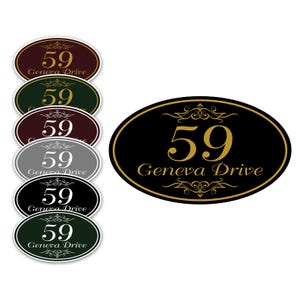 May include: Oval-shaped address plaques in various colors, including black, burgundy, and gray. Each plaque displays the number "59" and "Geneva Drive" in a decorative font. The plaques have a gold border and accents.