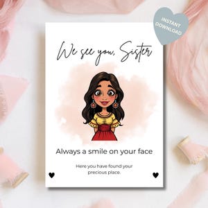 Könnte beinhalten: Eine weiße Grußkarte mit dem Text "We see you, Sister" und einer Illustration einer Frau in einem roten Kleid. Die Karte enthält auch die Sätze "Always a smile on your face" und "Here you have found your precious place."