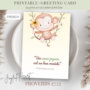 May include: A printable greeting card with a watercolour illustration of a monkey on a branch. The card includes the text "Un coeur joyeux est un bon remède" and "Proverbs 17:22". Designed to print on US Letter and A4 size paper.