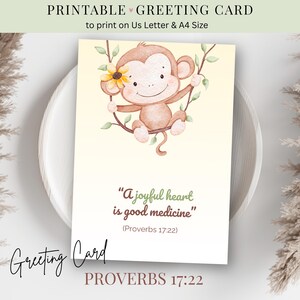 May include: A printable greeting card with a watercolour illustration of a smiling monkey on a branch with a yellow flower. The card includes the text "A joyful heart is good medicine" and "Proverbs 17:22".