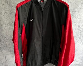 Nike Team 1990s windbreaker jacket swoosh logo Vintage