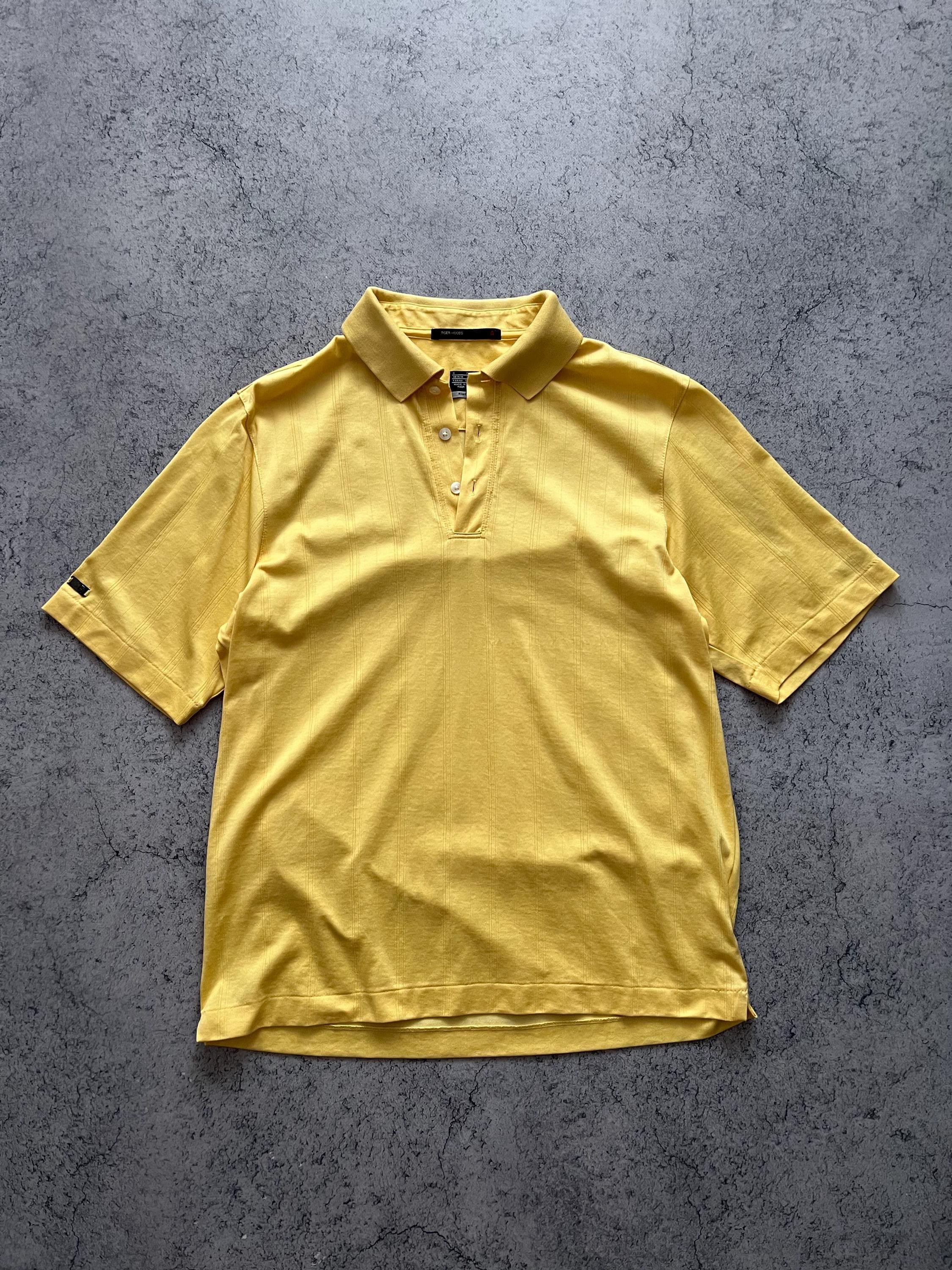 tiger woods yellow polo