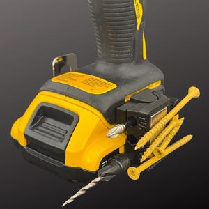 May include: A yellow and black cordless drill with a drill bit and several yellow screws attached. The drill has a black handle and the word "BRUSHLESS" is printed on the side. The drill is on a black background.