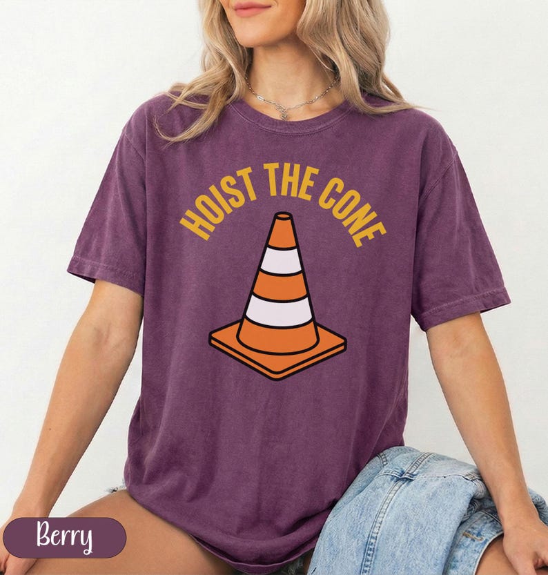 T-shirt with "Hoist the Cone" text and orange traffic cone graphic.