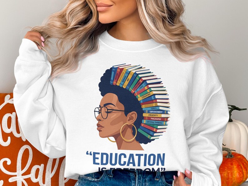 Woman with books as hair, "Education is Freedom" text.