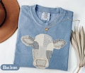 Faux Patchwork Cow T-Shirt, Quilted Farm Animal Head Tee, Gingham Floral Rustic Cow Lover Shirt, Cottagecore Farmhouse Gift product logo