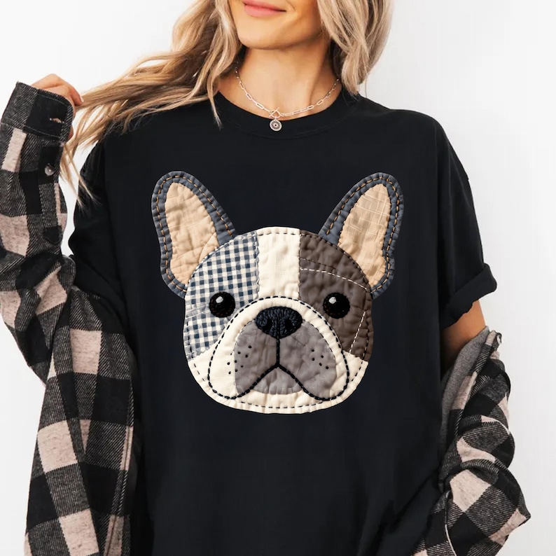 Black t-shirt with a patchwork French bulldog graphic.