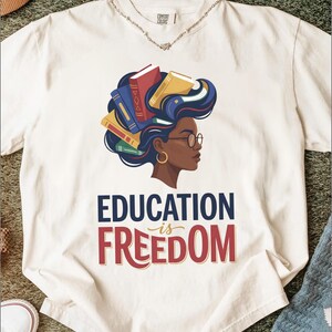 Woman with books in her hair, "Education is Freedom" text.