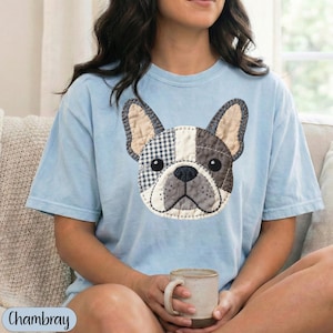 Light blue t-shirt with a patchwork French bulldog graphic.