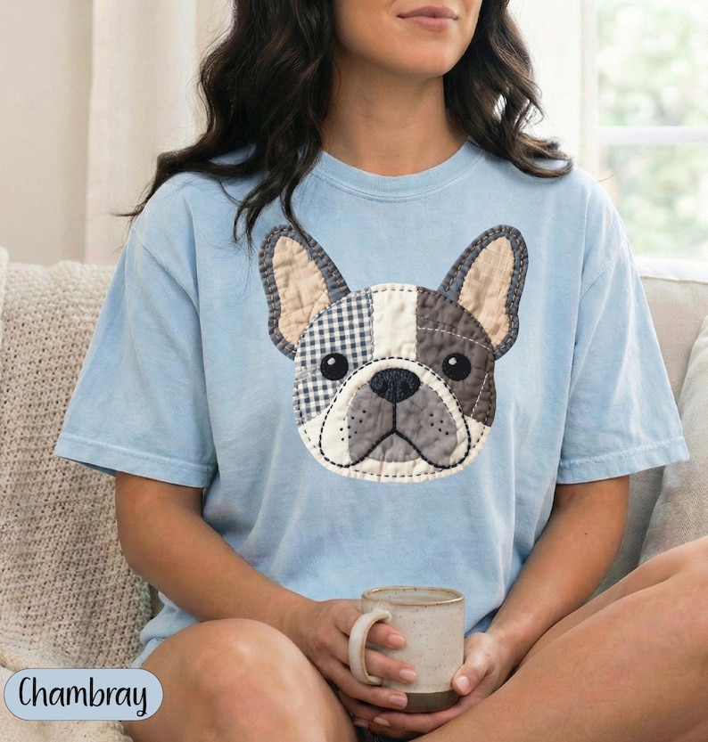 Light blue t-shirt with a patchwork French bulldog graphic.