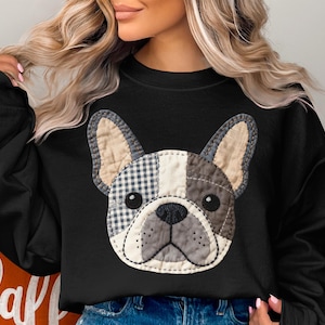 Black sweatshirt with a patchwork French bulldog graphic.
