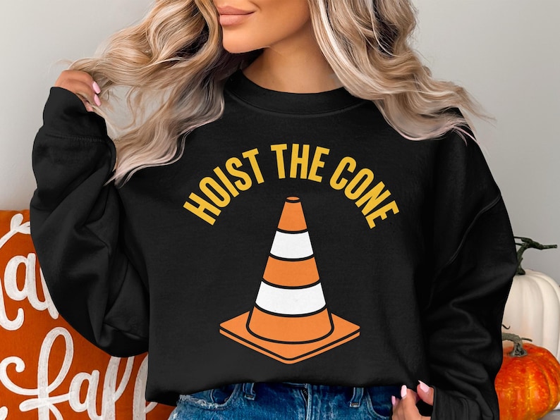 Black sweatshirt with orange and white traffic cone and "Hoist the Cone" text.