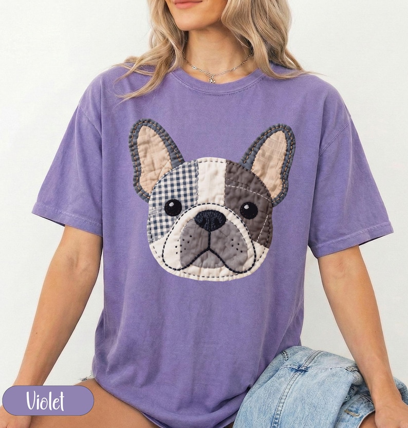 Purple t-shirt with a patch-style French bulldog graphic.
