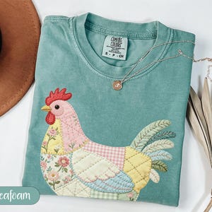 Seafoam Patchwork Chicken T-Shirt, Quilted Rooster Tee, Cottagecore Farm Animal Shirt, Floral Gingham Hen Top, Farmer Gift
Chicken shirt