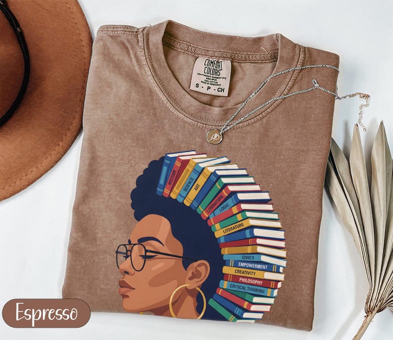 Brown t-shirt with woman reading stacked books; Espresso color.