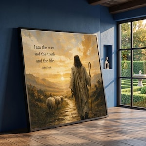 Puede incluir: Un cuadro rectangular enmarcado que muestra una figura con túnica caminando por un sendero con ovejas hacia el atardecer. El texto dice: I am the way and the truth and the life. John 14:6. La escena presenta tonos dorados y marrones cálidos.