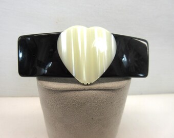 Zwart-wit acryl harthaarclip