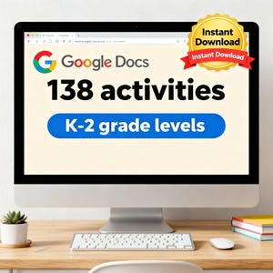 May include: A computer monitor displays a Google Docs page with the text "138 activities" and "K-2 grade levels." A gold and red "Instant Download" badge is in the upper right corner. A small succulent plant, keyboard, mouse, and books are on the desk.