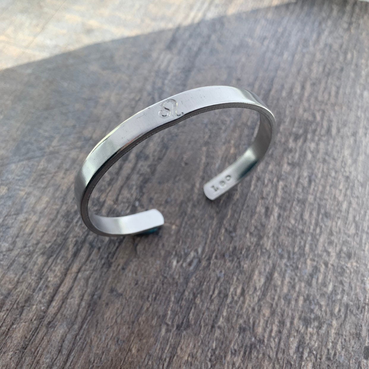 Custom Zodiac Sign Hand Stamped Cuff Bracelet, view 2