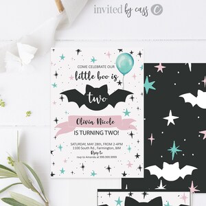 May include: A black and white bat with pink and blue stars on a black background. The text "Olivia Nicole is turning two!" is on a pink banner. The text "Come celebrate our little boo is two" is on a white background with a blue balloon. The text "RSVP to Amanda at 999.999.9999" is on a white background. The text "Thank you" is on a white background with a black bat and pink and blue stars.