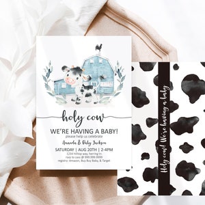May include: A baby shower invitation with a watercolor illustration of a cow in front of a blue barn. The text "holy cow! we're having a baby!" is written in black cursive font. The invitation includes the date, time, and location of the shower.