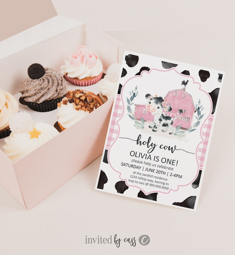May include: A pink and white cow-themed party invitation with a watercolour illustration of a cow and a red barn. The text reads "holy cow Olivia is one! please help us celebrate Saturday | June 20th | 2-4pm at the sandhill residence 1234 hilltop way, herring tn rsvp to cass @ 999.999.9999 invited by cass".
