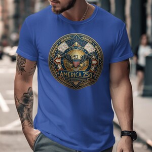 Blue t-shirt with round "America 250" logo featuring eagle and fireworks.