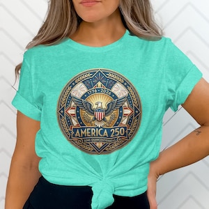 Turquoise t-shirt with "America 250" circular logo featuring eagle, stars, and stripes.