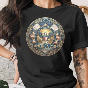 Black t-shirt with "America 250 Semi-Quincentennial" emblem featuring eagle and fireworks.