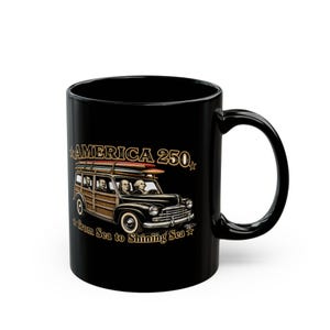 Black mug with wooden car, America 250, and "from Sea to Shining Sea" text.