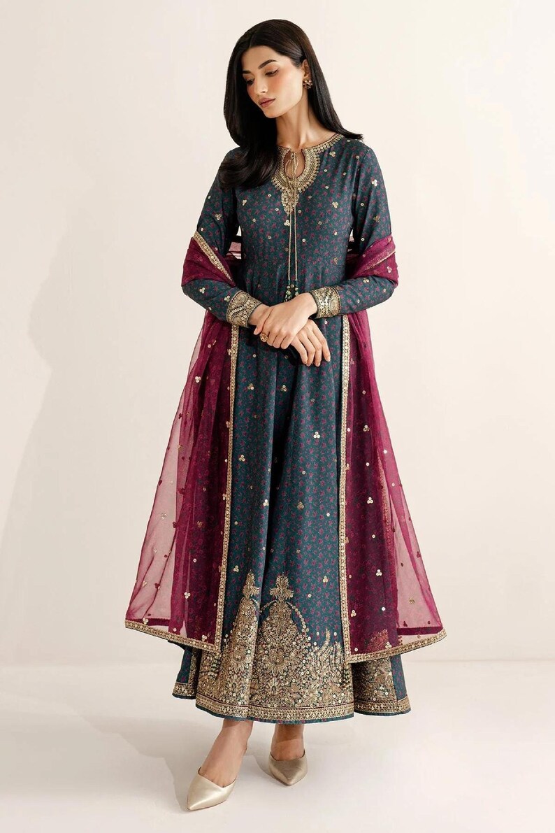 Embroidered raw-silk UR-7058: navy salwar kameez, three-piece Pakistani suit with gold-embroidered kameez and maroon dupatta.