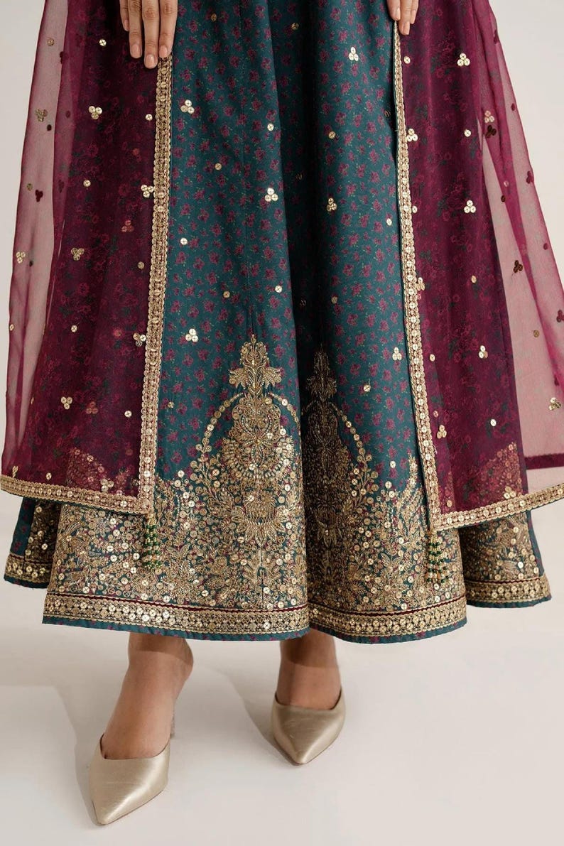 Embroidered raw-silk UR-7058: navy salwar kameez, three-piece Pakistani suit with gold-embroidered kameez and maroon dupatta.