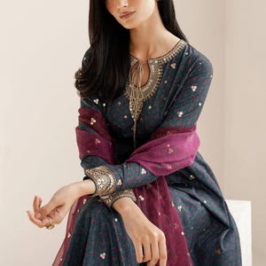 Embroidered raw-silk UR-7058: navy salwar kameez, three-piece Pakistani suit with gold-embroidered kameez and maroon dupatta.