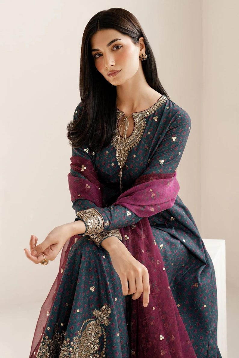 Embroidered raw-silk UR-7058: navy salwar kameez, three-piece Pakistani suit with gold-embroidered kameez and maroon dupatta.