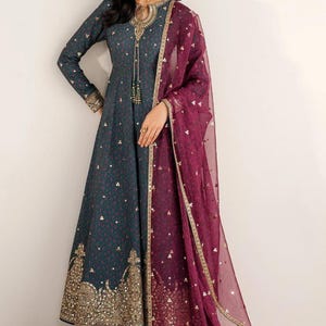 Embroidered raw-silk UR-7058: navy salwar kameez, three-piece Pakistani suit with gold-embroidered kameez and maroon dupatta.