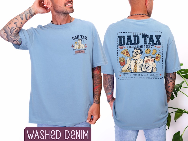 May include: Light blue t-shirt with the text "DAD TAX" and a cartoon graphic on the front and back. The back graphic reads "OFFICIAL DAD TAX COLLECTION AGENCY" with a cartoon man eating pizza and fries. The shirt is labeled "WASHED DENIM".