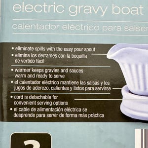 K&ouml;nnte beinhalten: Eine hellblaue elektrische Sauciere mit geripptem Au&szlig;endesign. Die Verpackung enth&auml;lt Text, der Funktionen wie einen Ausgie&szlig;er, einen W&auml;rmer zum Warmhalten von Saucen und ein abnehmbares Kabel f&uuml;r bequeme Servieroptionen hervorhebt.