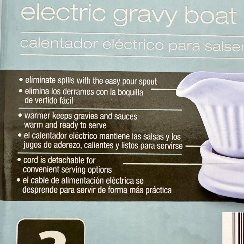 K&ouml;nnte beinhalten: Eine hellblaue elektrische Sauciere mit geripptem Au&szlig;endesign. Die Verpackung enth&auml;lt Text, der Funktionen wie einen Ausgie&szlig;er, einen W&auml;rmer zum Warmhalten von Saucen und ein abnehmbares Kabel f&uuml;r bequeme Servieroptionen hervorhebt.