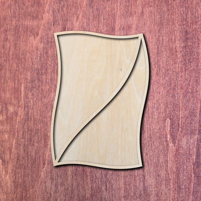 May include: A light-colored wooden cutout shaped like a rectangular piece of paper with wavy vertical edges, featuring a diagonal slit that divides the shape into two distinct sections, creating a layered appearance with a smooth, natural wood grain.